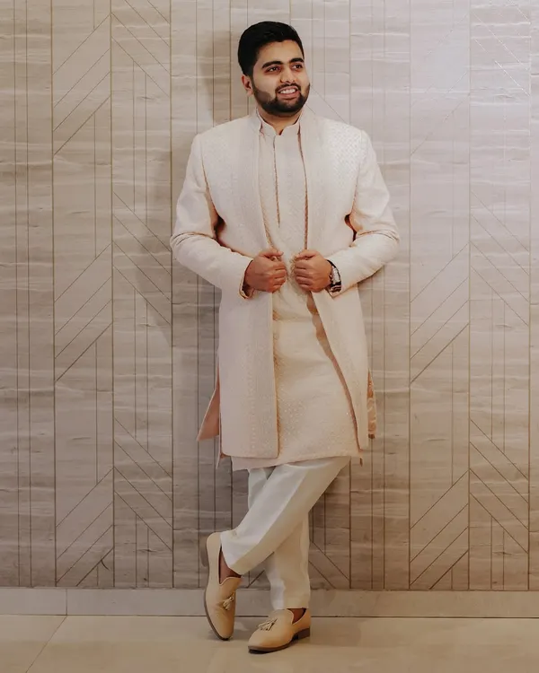 A stylish portrait of the groom, looking sharp and confident in his elegant sherwani. We make sure the groom's solo shots are just as impressive.