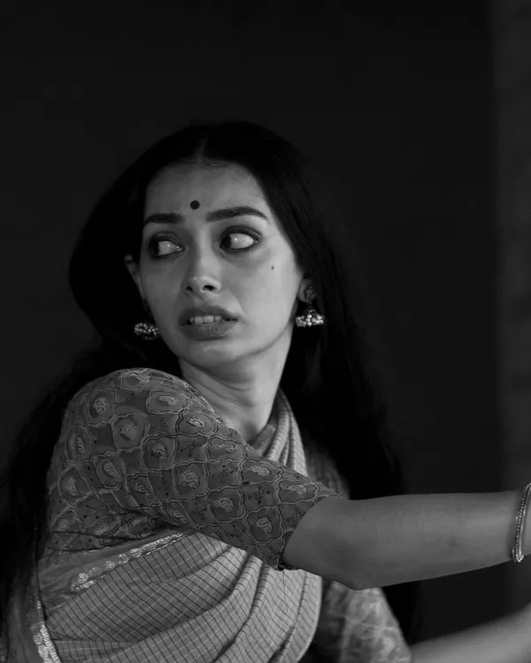 This is from a photo series exploring 'Bhaya', the rasa of fear. Here, I'm channeling a sense of immediate, wide-eyed panic, as if reacting to something just out of frame.