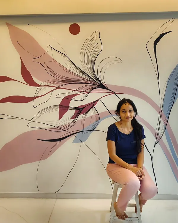 Here I am with a finished freehand boho-style wall art. This modern, freestyle piece uses pleasant colors and nature elements to create a soothing feel in a luxury home's living room.