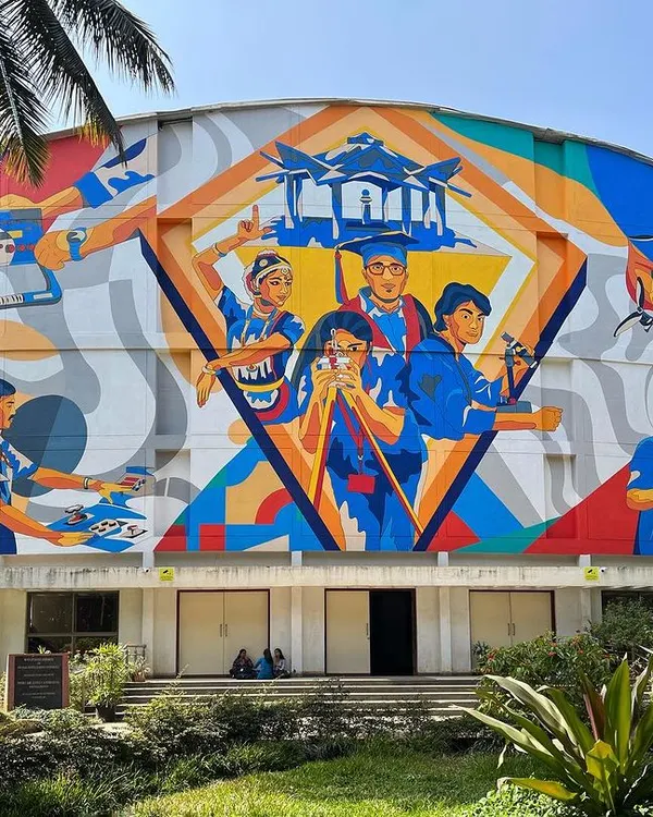 We transformed the massive 50-foot auditorium wall at MVJ College of Engineering into a vibrant story of student life. This colorful mural celebrates the energy and dreams of the campus, creating a landmark that inspires students every day.