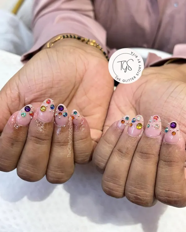 This set is all about colorful bling. I've used multi-colored rhinestones of different sizes to create a fun, jeweled effect on a neutral base.