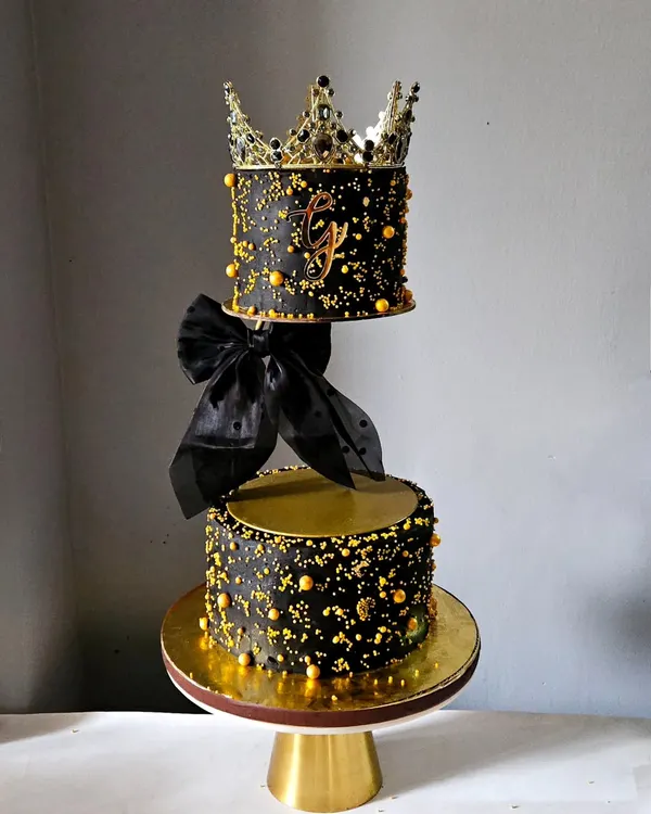 This is what I mean by a showstopper. I crafted this two-tier, black and gold couture cake to float, creating a truly magical centerpiece for a 13th birthday. It’s a testament to how we can push the boundaries of cake design using primarily light and delicious whipped cream.