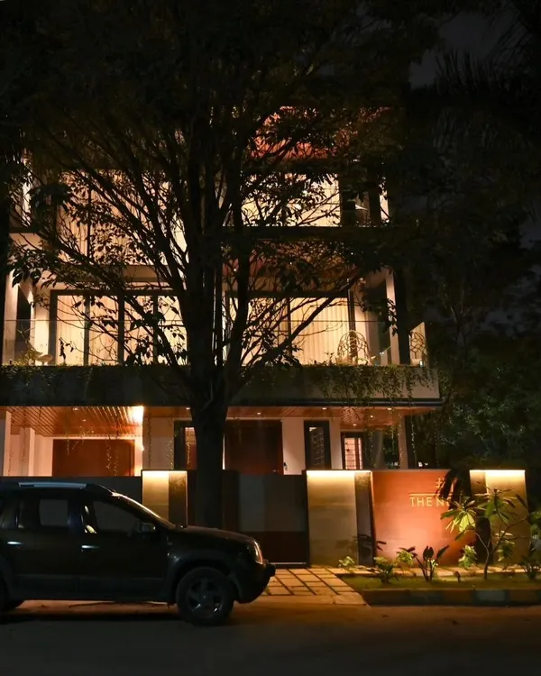 Arriving home to a warm, welcoming glow. This is the exterior of 'The Nest' project, where automated outdoor lighting provides both beauty and security.