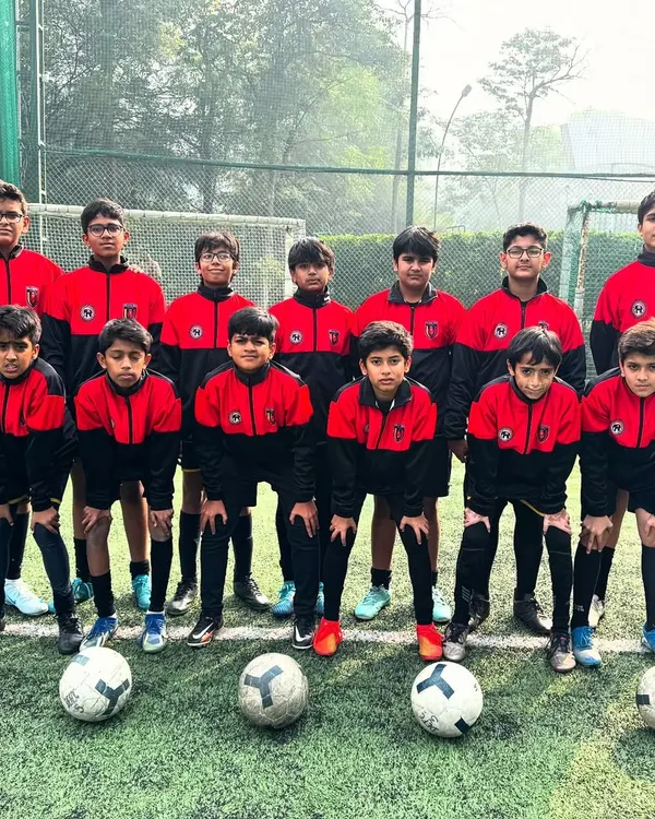 Elite performance needs elite style. Our U-13 warriors ready to conquer the pitch in their winter kit.