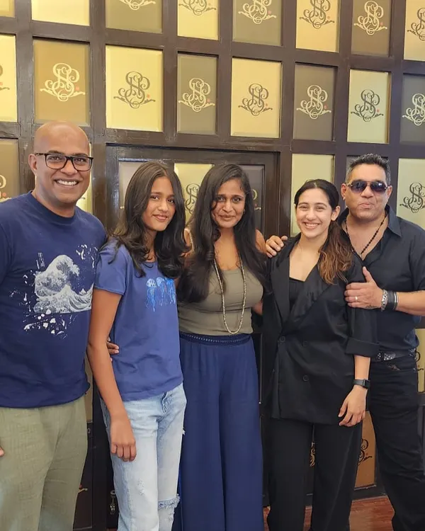 A family visit to the salon is always a good time. I'm here with a group of happy clients after their appointments, all looking refreshed and ready to go.