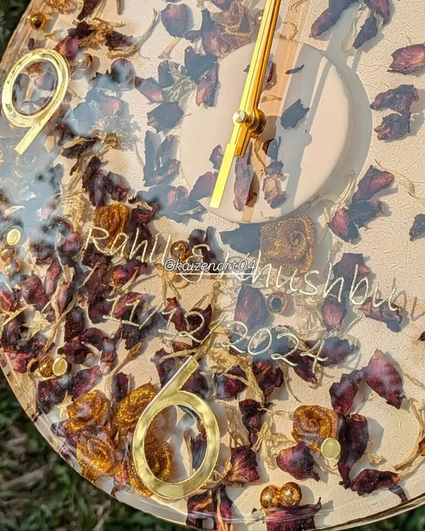 Your wedding flowers are too precious to throw away. Here, I've preserved a couple's varmala flowers in a 12-inch wall clock, complete with their names and wedding date. It's a beautiful way to remember your special day, every day.