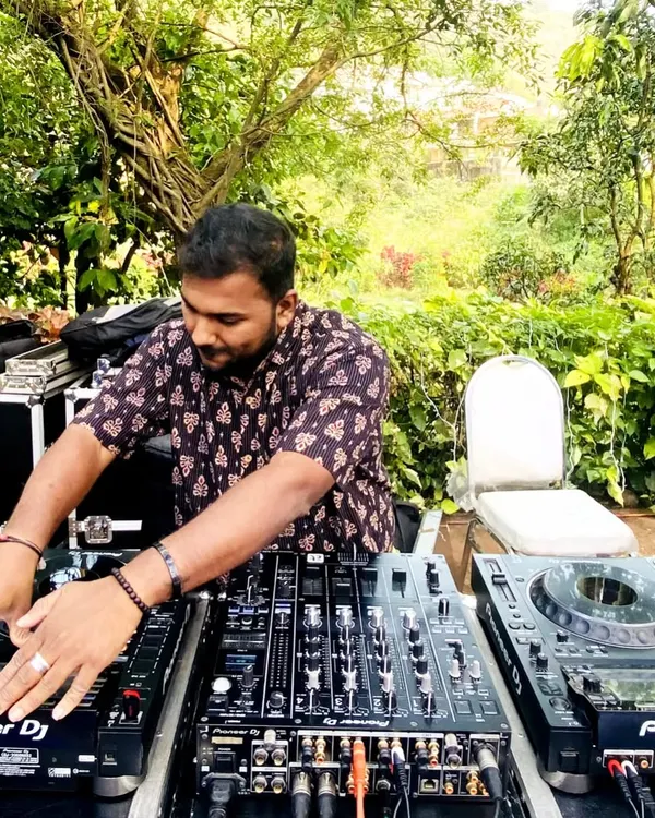 This is my workspace. I am hands-on with my Pioneer DJ gear, ensuring every transition is smooth and every beat drops right on time. Quality equipment is key to delivering a professional sound experience.