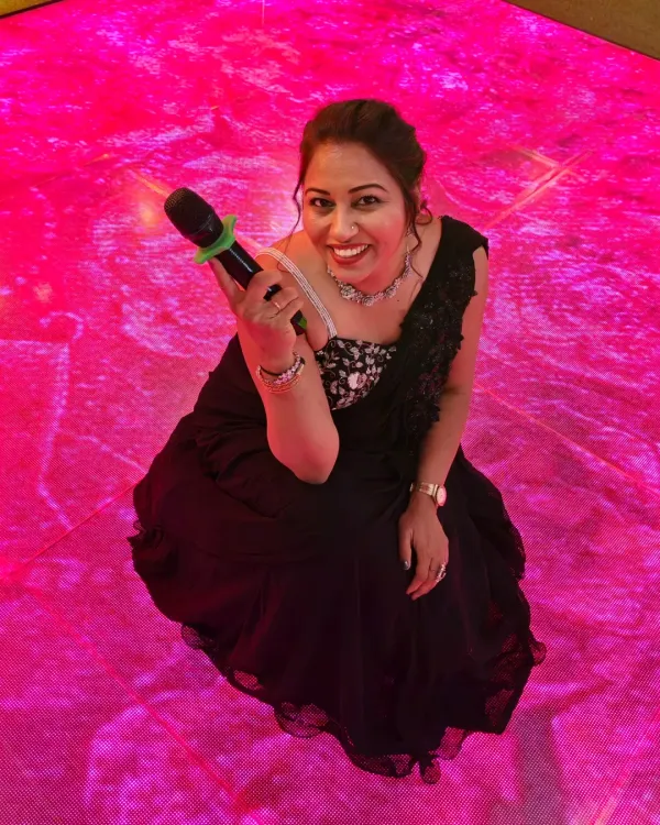A fun, high-angle shot on the LED dance floor. I am not just a host on the stage; I am part of the celebration on the floor too.