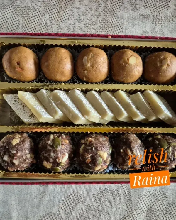 A close-up of my assorted sweet box, perfect for gifting. This one features soft Sattu Laddoos, classic Kaju Katli made from whole cashews, and healthy Ragi Laddoos packed with dry fruits and sweetened with dates and jaggery.