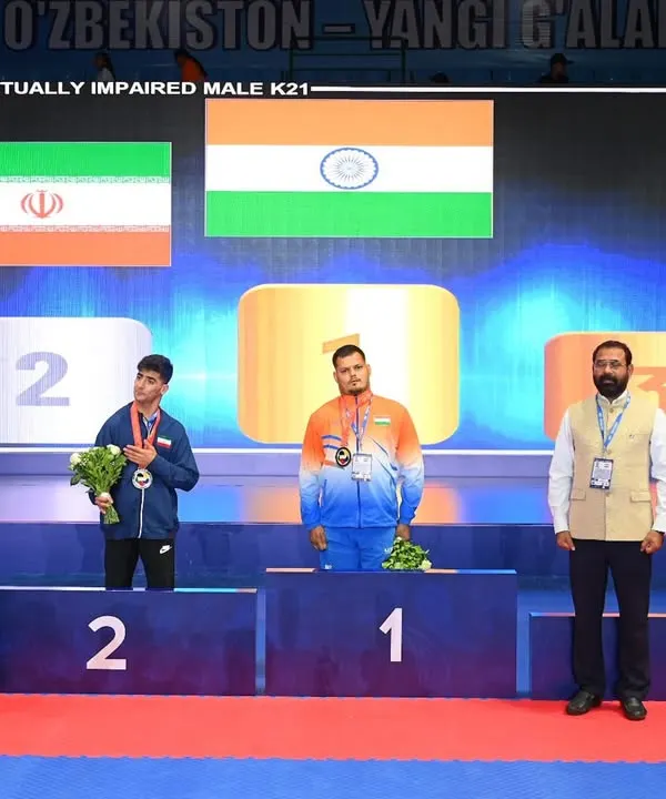 The Indian flag flying high at the 21st Asian Para Karate Championship in Uzbekistan. Our para-athlete Tarun Sharma stands at the number one position on the podium after winning the Gold Medal, a historic moment for Indian para-karate.