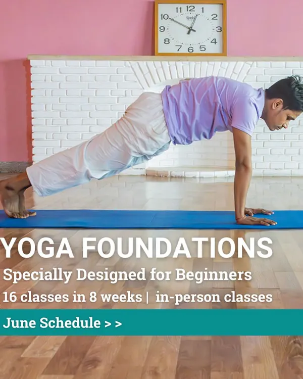 Our Yoga Foundations course is a 16-class program spread over 8 weeks, specially designed for beginners. This image shows a student in Plank Pose, building the core strength that is fundamental to the practice.