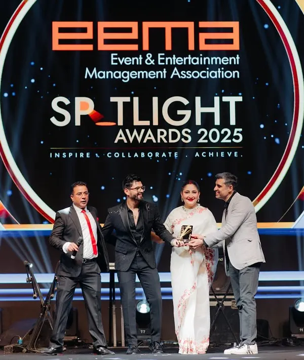 On stage receiving an award at the EEMA Spotlight Awards. Being recognized by the Event and Entertainment Management Association is a huge honor.