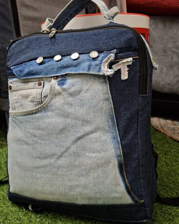 This unique and sturdy backpack is a great example of our upcycling service. I transformed a pair of old, unwanted jeans into a stylish and functional accessory, complete with original pockets and durable construction.