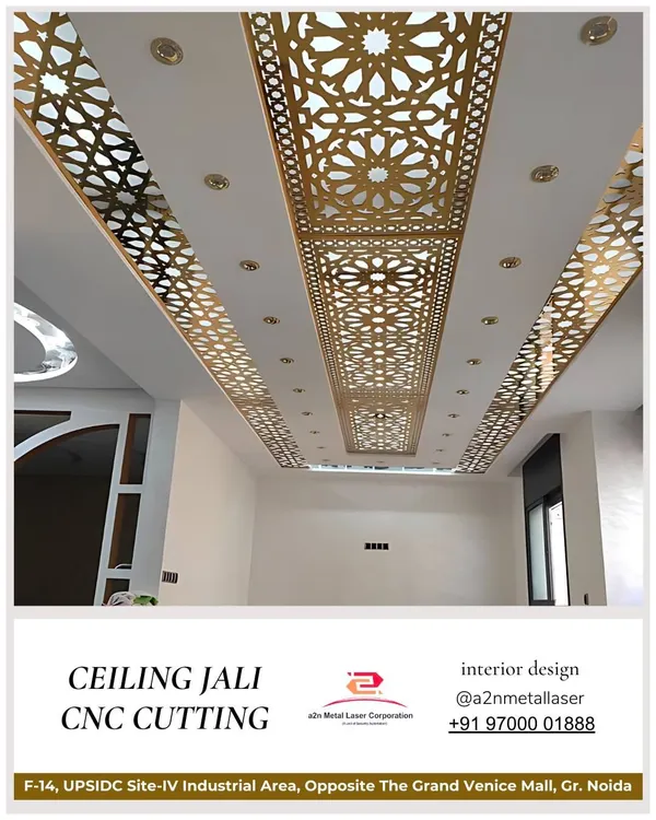 This luxurious ceiling features a long central panel of gold-finished CNC cut jali. The traditional pattern is flanked by simpler jali strips and integrated with cove lighting, turning the entire ceiling into a grand, decorative element.