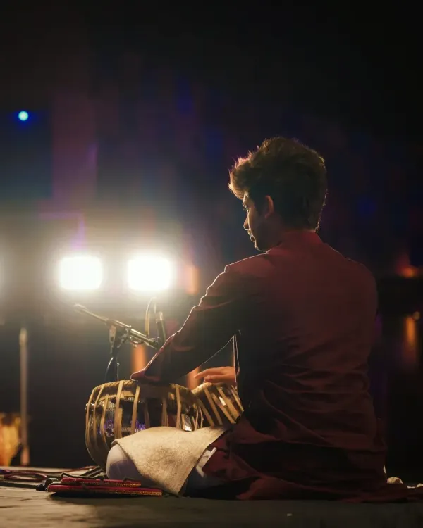 This is my sanctuary. A moment of complete focus on stage, where the rhythm takes over and everything else fades away. This is the essence of a live tabla performance.