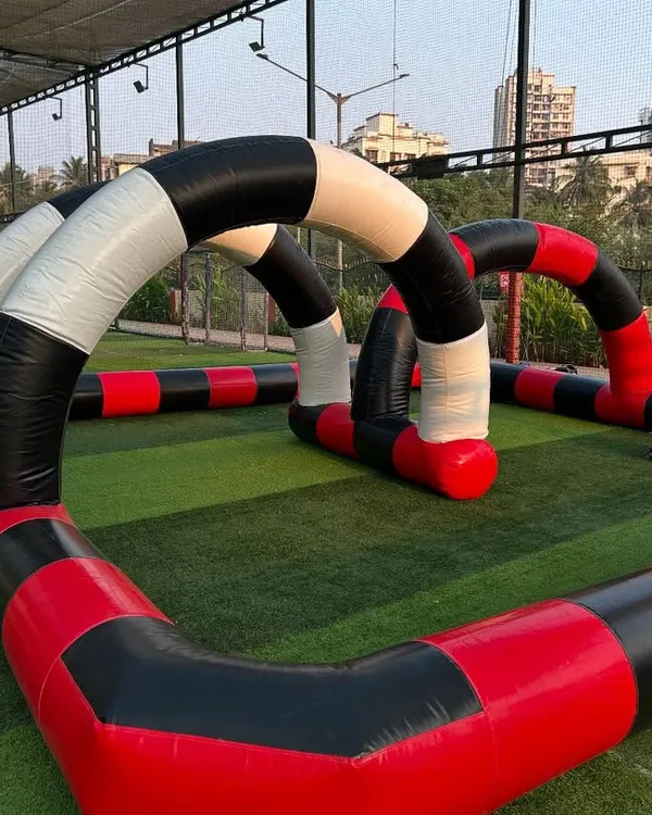 This is our full inflatable go-kart track, set up and ready for action. The defined course and soft barriers make it a safe and exciting racing environment for kids' parties.