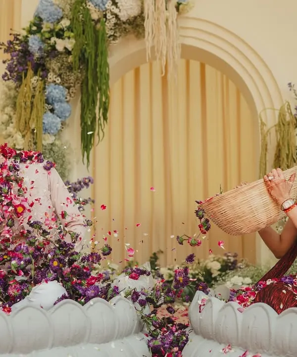 A playful moment during the 'phoolon ki haldi'. Watching the couple laugh and shower each other with petals was a reminder that love does not always need words.