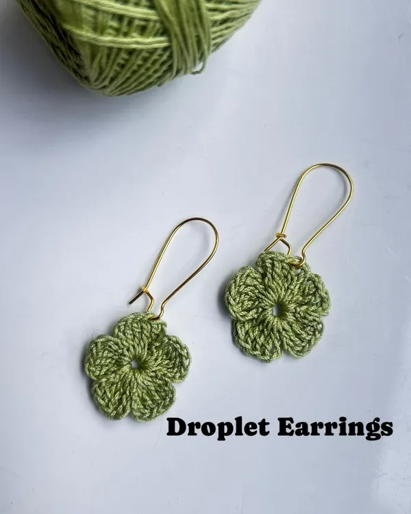 These versatile floral earrings can be worn as droplets, as seen here with elegant kidney hooks.