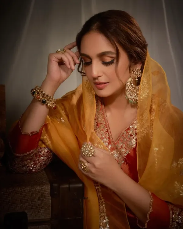 A moment of quiet elegance with Huma Qureshi. She is styled in a rich, embroidered velvet kurta set by Heena Kochhar, complemented by exquisite jewels from Golecha Jewels.