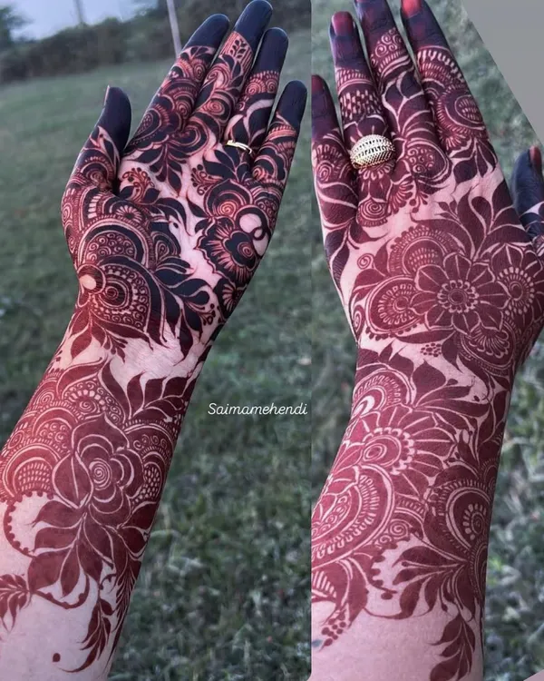 This is the result I strive for with every client. A deep, rich maroon stain that shows the quality of my all natural henna paste. The design is a classic full coverage floral pattern, perfect for making a statement at any wedding or festival.