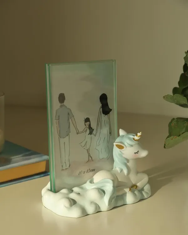 Elevate your child’s space with this whimsical unicorn photo frame. With its pastel tones and dreamy cloud base, it’s the perfect way to preserve a precious moment.