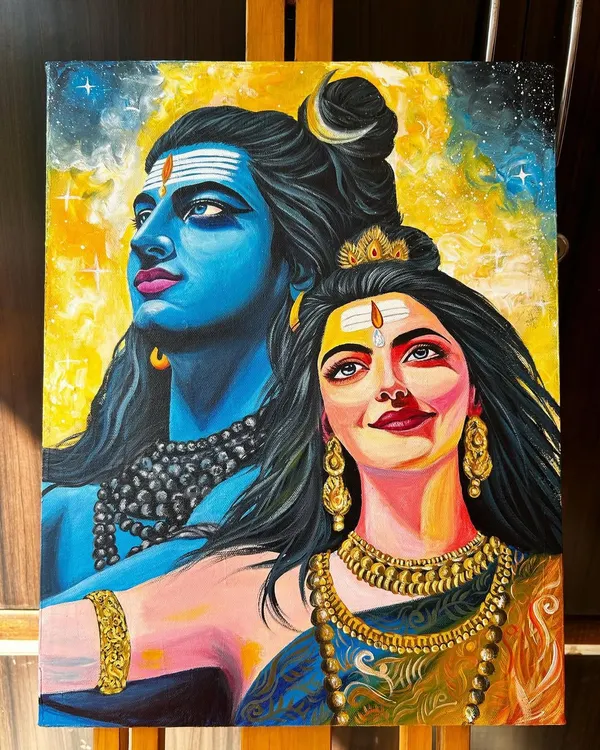 A finished portrait of Shiv and Parvati, painted with acrylics on an 18x14 inch canvas. I used a vibrant yellow background to contrast with Mahadev's iconic blue, creating a piece that radiates divine energy.