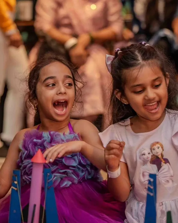The countdown to launch! The excitement is contagious as friends get ready to test their handmade rockets together. Our parties are filled with these moments of shared discovery and friendly competition.