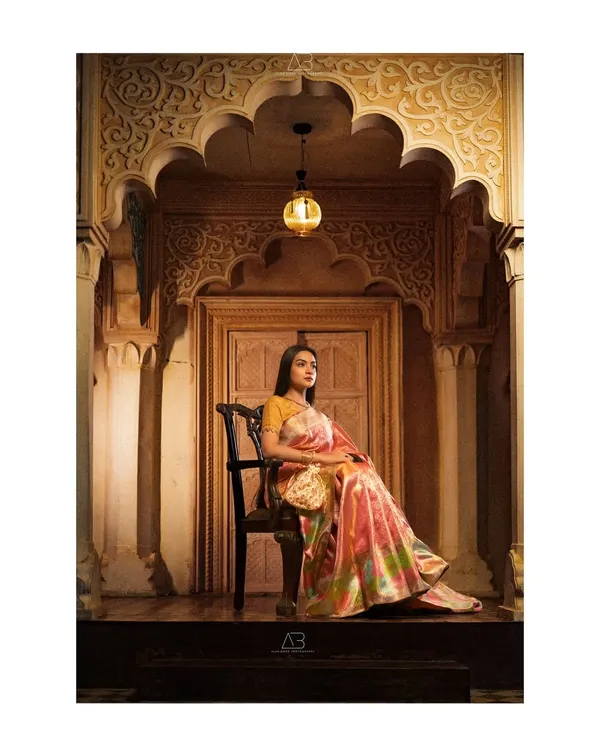 This is the kind of iconic, cinematic frame I strive to create. For this Kanchipuram saree campaign, we used dramatic lighting and a grand setting to evoke a sense of timeless royalty and heritage.