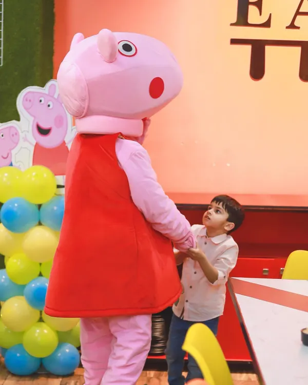 A heartwarming moment between the birthday boy and Peppa Pig. Our mascot appearances provide fantastic photo opportunities and create magical memories for the children.