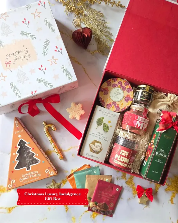 This is what holiday magic in a box looks like. I've curated this luxury Christmas hamper with a mix of indulgent gourmet treats and festive classics, all packed in a keepsake box. It’s designed to impress, making it a perfect premium gift for the people who matter most.