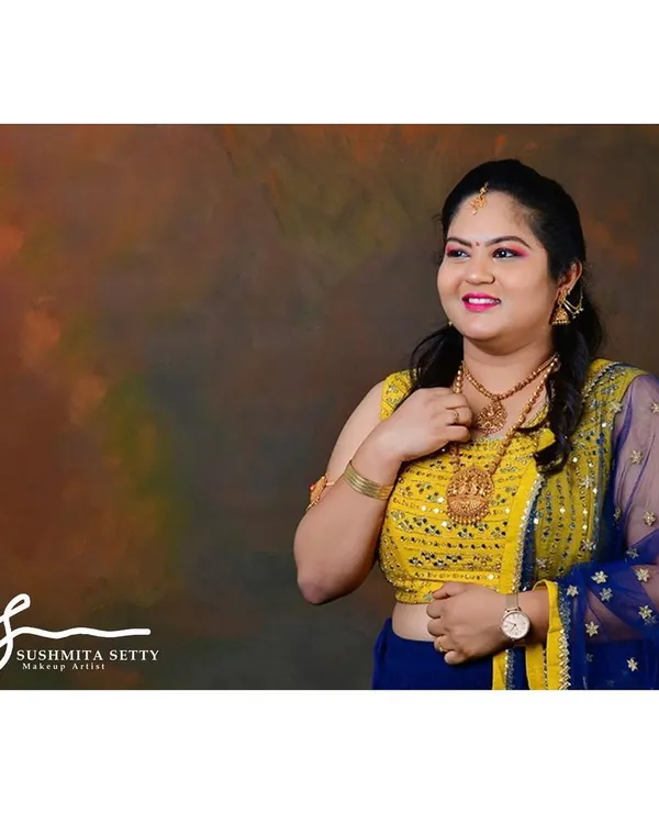 A beautiful and bright makeup look for a photoshoot with traditional Indian attire. I used a soft pink lip and defined eyes to complement the model's vibrant yellow and blue outfit.