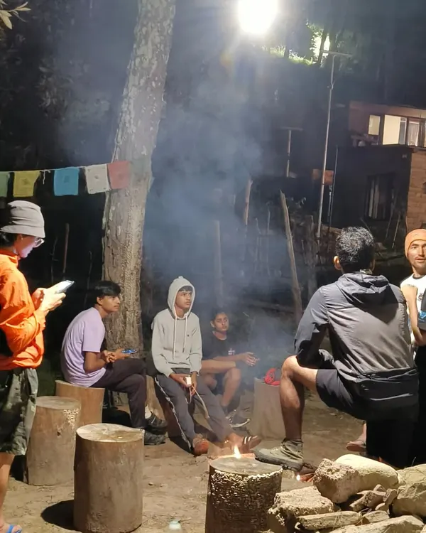 After a full day of riding, the evening is for unwinding. Our campsite becomes a hub for conversation and community, with riders gathering around the fire to share their experiences from the trail.
