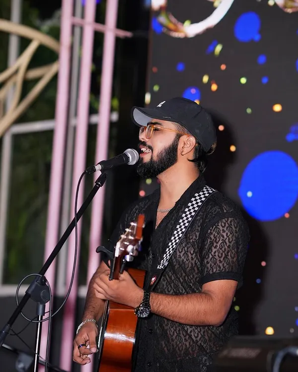 A candid shot from a live performance, capturing a moment of connection with the music. This is the focus and passion I bring to every show, big or small.