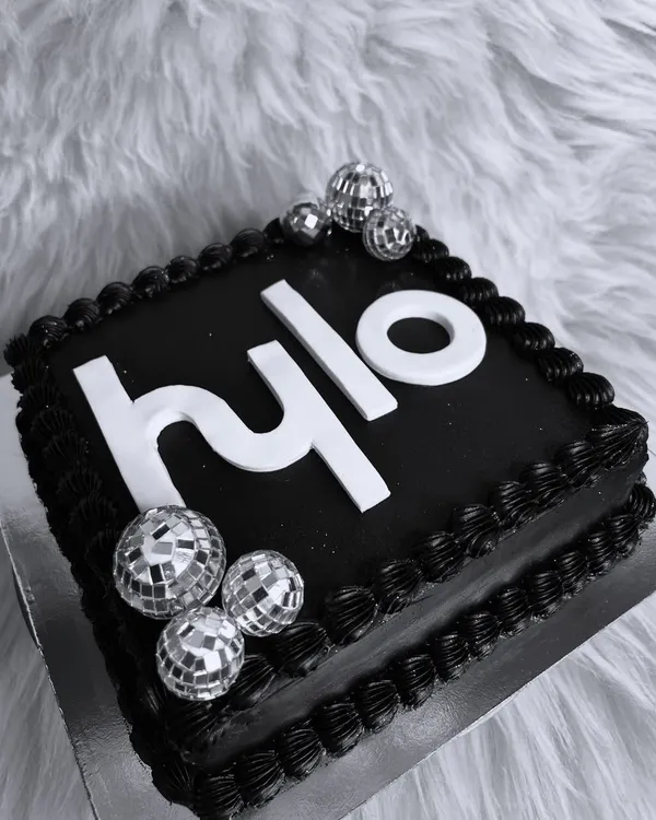A sleek, black-and-white logo cake for the launch of Hylo Mumbai. We love creating custom cakes that match a brand's aesthetic for their most important events.