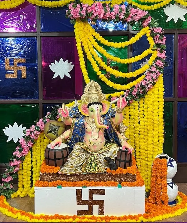 Our beautifully decorated idol for the Ganesh Chaturthi Celebration in 2023. We celebrate with puja, havan, and cultural events. Ganpati Bappa Morya!