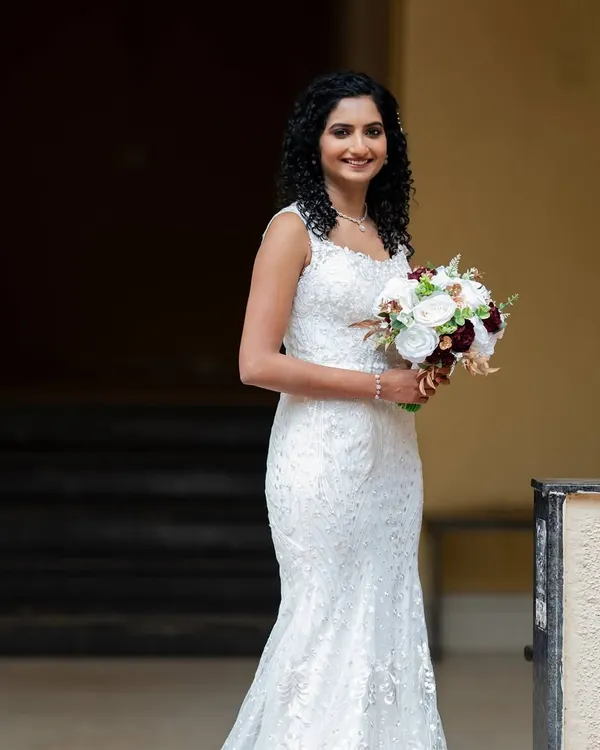I love working with natural curls. For this bride, I created a soft, romantic hairstyle that enhanced her beautiful texture, paired with glowing, minimal makeup.
