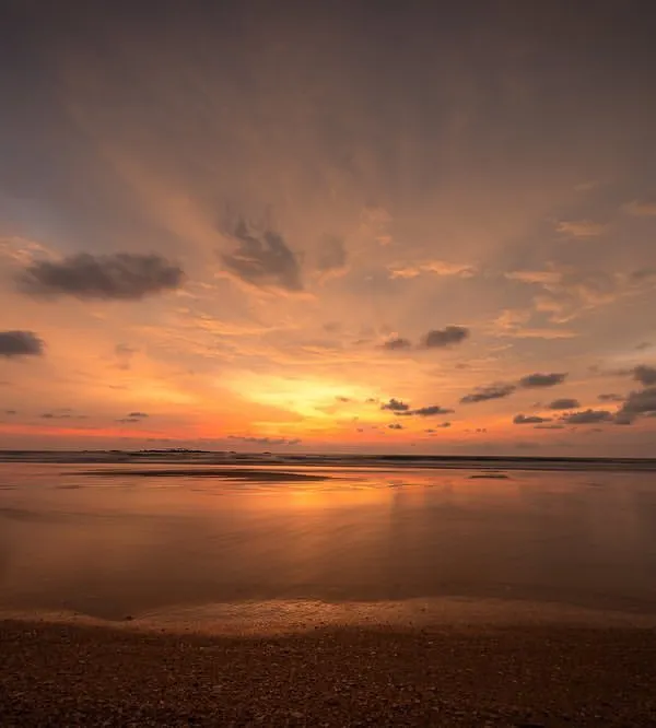 A dramatic sunset over the beach in Udupi. Mountains, oceans, and rivers are a landscape photographer's playground, and the Karnataka coast offers it all.