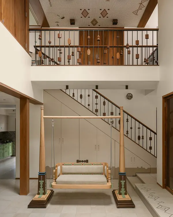This custom-designed Oonjal, or traditional swing, is the heart of our Kolam Pop project. We reinterpreted classic South Indian temple architecture and Kolam motifs into a modern, playful form. The turned wood posts and colourful, geometric base make it a functional sculpture that brings joy and heritage into the home.