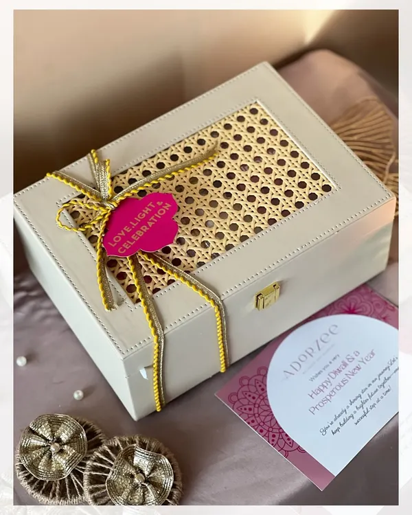 This elegant rattan box is one of my signature Diwali hampers. It’s filled with love, light, and celebration, combining traditional elements like dhoop sticks and diyas with gourmet treats. It’s the perfect way to send warm wishes.