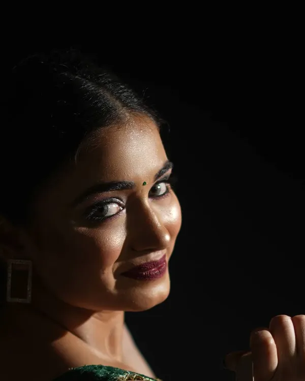 This is a classic, dramatic headshot that every model needs in their book. By using a single light source, I created a strong contrast that emphasizes bone structure and creates an intense, captivating mood focused entirely on the expression.