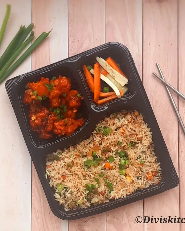 Sometimes you just crave something different, which is why I love adding Indo-Chinese meals to my daily menu. This combo includes my popular Gobi Manchurian, vegetable fried rice, and some crisp pickled veggies, packed and ready for your office lunch.
