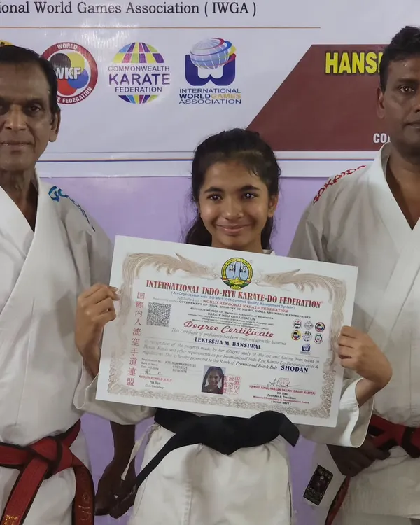 A proud moment for my student Lekissha, holding her official 1st Degree Black Belt (Shodan) certificate. This document represents years of dedication, discipline, and consistent practice.