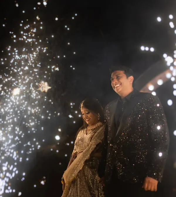 A magical end to a perfect day. I love capturing couples surrounded by the sparkle of fireworks, a truly cinematic moment that symbolizes the bright start to their new life.