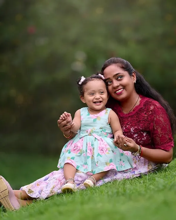 A sweet and relaxed portrait of a mother and her little girl enjoying a quiet moment together on the grass. These are the simple, beautiful memories I love to preserve.