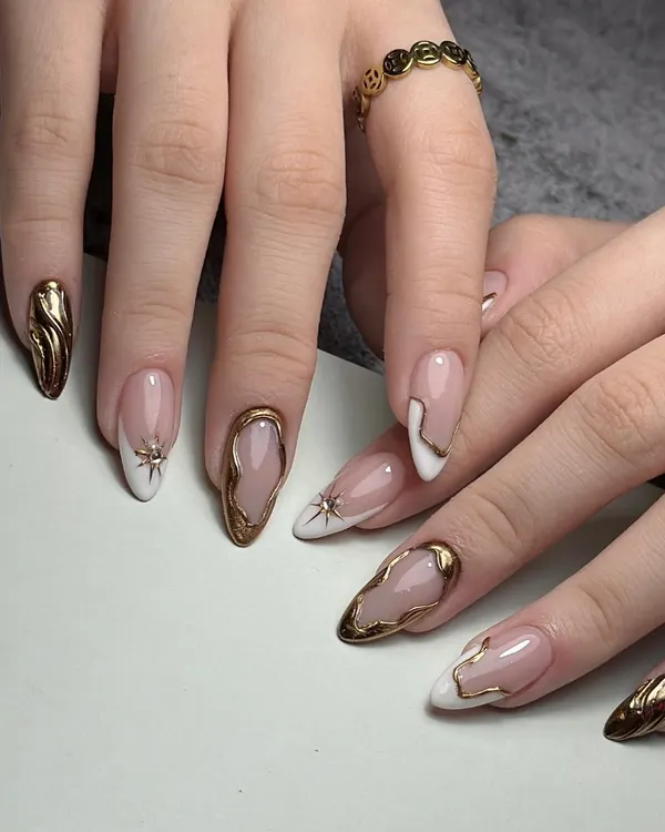 This is my modern take on a classic, combining a clean French manicure with abstract, liquid gold chrome details and a delicate star accent. It’s a perfect example of how I create unique, high-end nail art that’s both elegant and trendy.