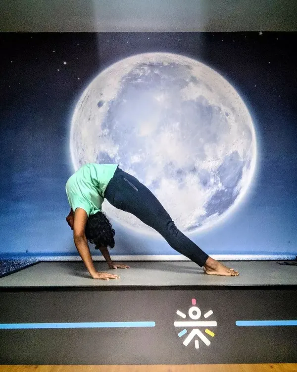 This pose, Camatkarasana or Wild Thing, is about finding strength in vulnerability. For me, it represents the idea of bending with life's challenges without breaking, a core part of my healing journey and teaching.