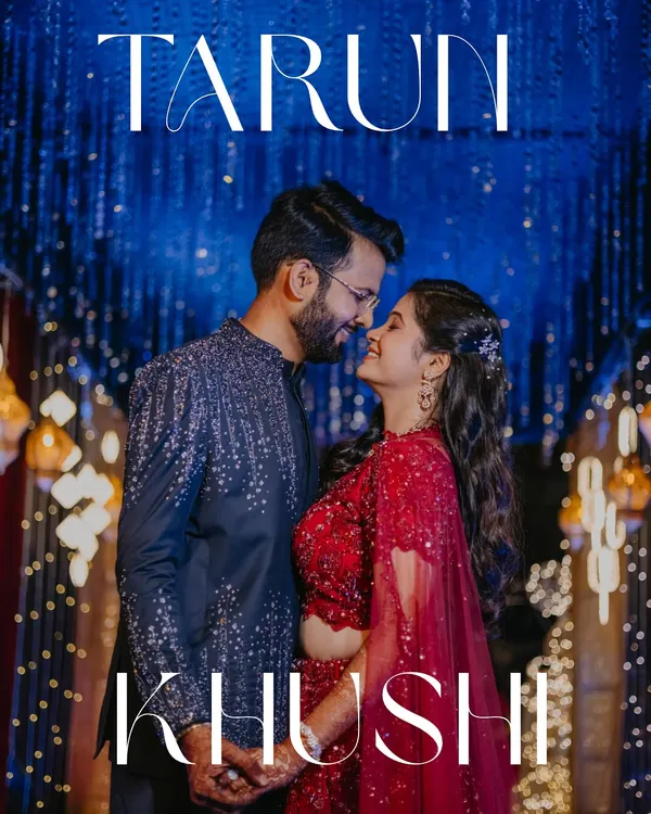 Under a canopy of blue lights, this couple shares a look that says it all. We love creating these magical, romantic portraits during the Sangeet night that feel like a still from a movie.