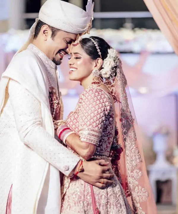 This is the kind of moment I live to capture. A quiet, unposed laugh between Nupur and Chinmay on their wedding day, a memory of pure happiness. My goal is to find these real, candid moments that tell the true story of your love.