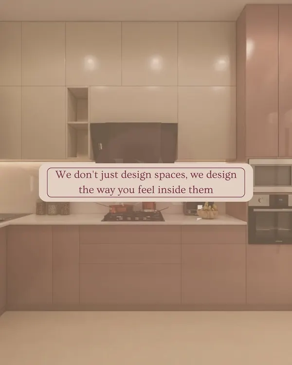 This kitchen design is built around the philosophy that a space should make you feel good. The sleek, handleless cabinets in a soft, neutral tone create a calm and uncluttered environment, perfect for enjoying the process of cooking.