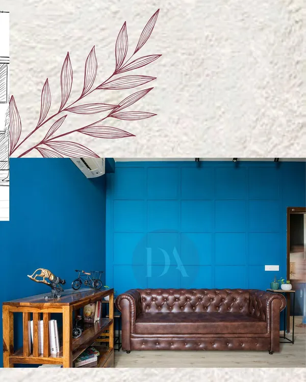 This is the final look of a living room corner, brought to life from a sketch. The bold blue paneled wall provides a stunning contrast to the classic brown leather Chesterfield sofa, creating a space with strong character.